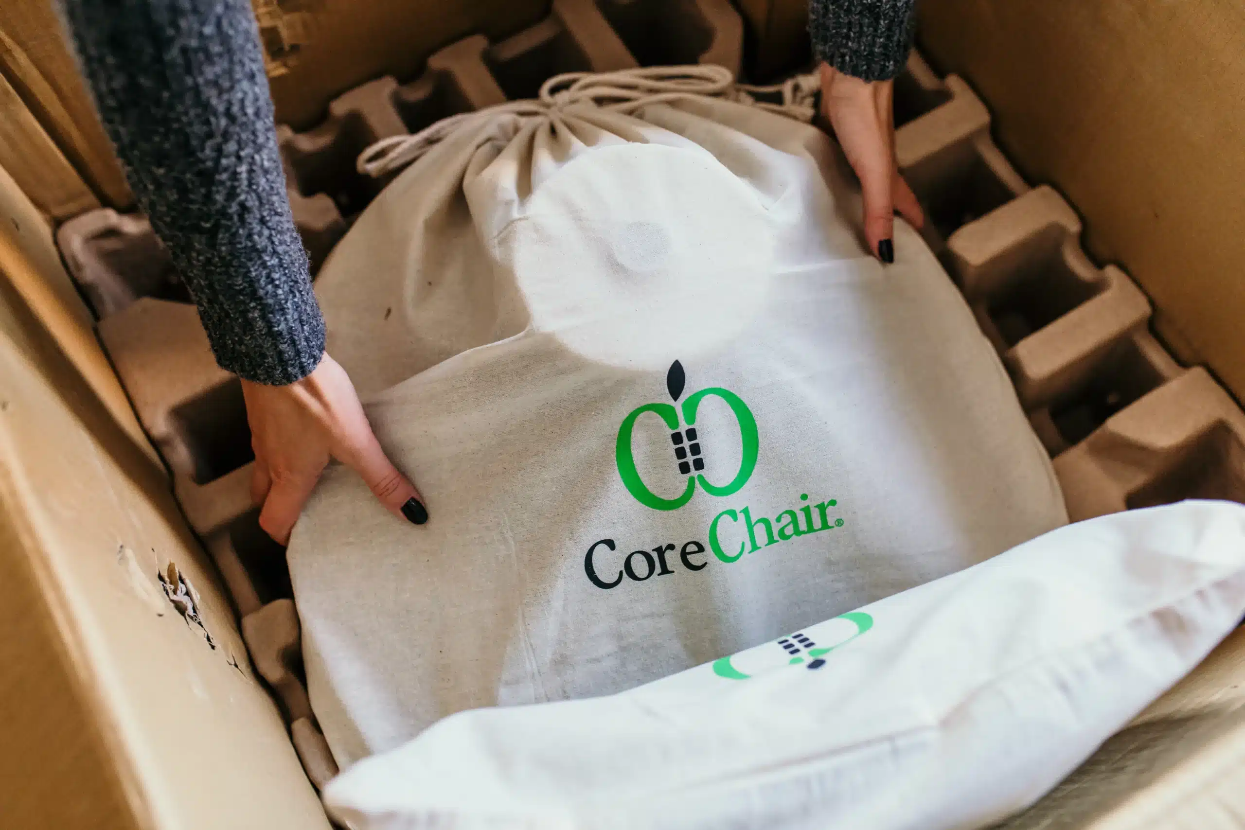 Opening CoreChair Box with Environmentally Friendly Packaging
